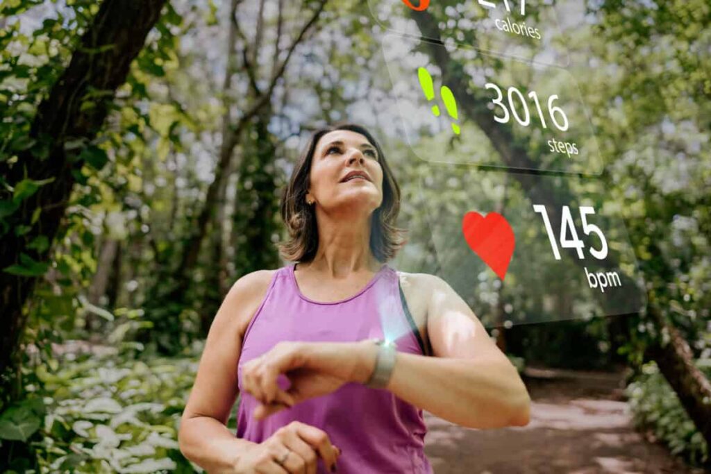 Gildan’s Vertically Integrated Supply Chain Could Be the Best Tariff Shield Yet runner checks her biodata on smartwatch